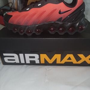 Nike Black and Red Youth Athletic Shoes with Swoosh